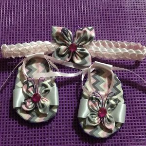 new born shoes with matching headband.
